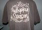 A faded brown short-sleeve t-shirt featuring a large white graphic on the back with the words 'Pumpkin Season' inside a pumpkin outline.